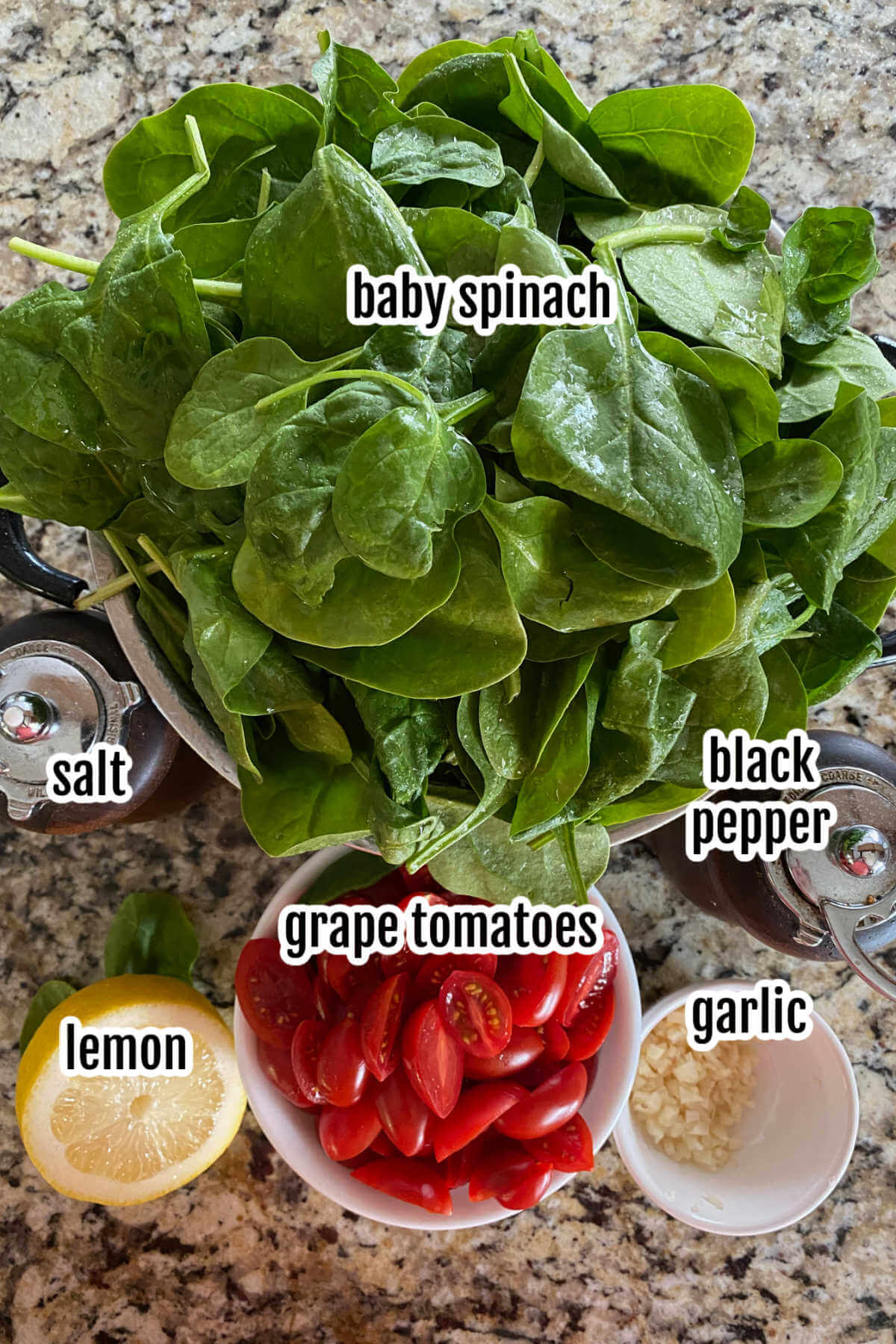 Image of ingredients needed for the recipe Baby Spinach With Grape Tomatoes. 