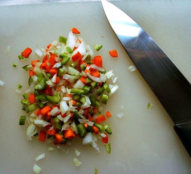 Preparing a soffritto for the gnocchi in brood.