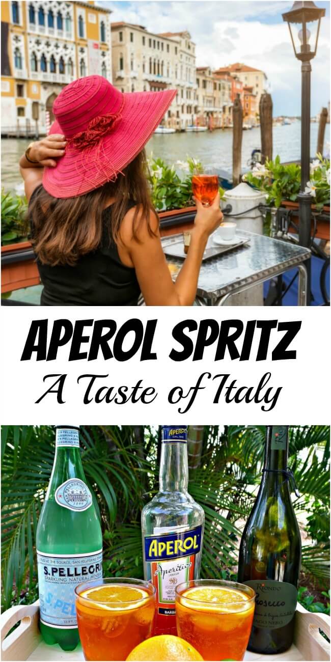 Young woman wearing a large red straw hat holding an aperol spritz in her hand while she looks at Venice, Italy's Grand Canal 