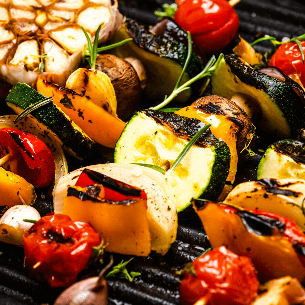 Mixed vegetables on skewer that have been grilled and basted with lemon vinegar butter sauce. 