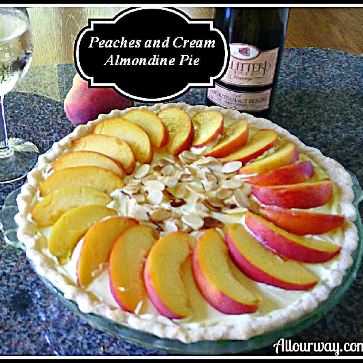 Peaches and Cream Pie with sliced peaches and shaved almonds on top.