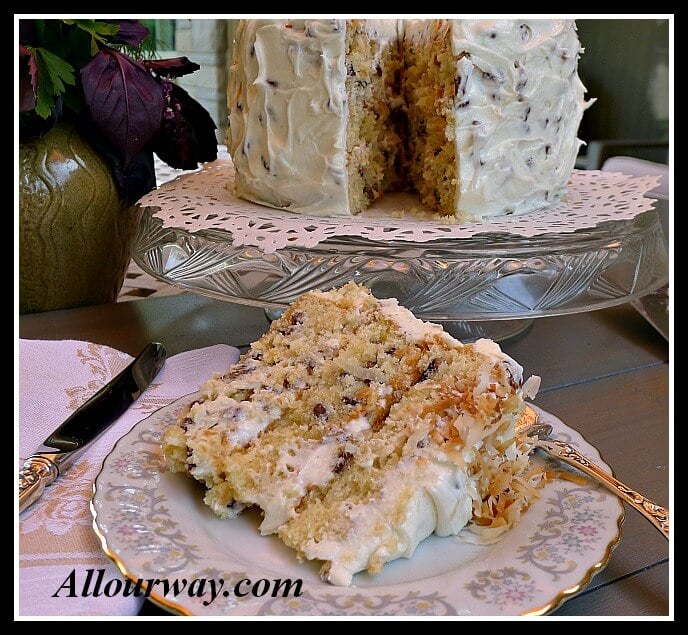 Italian Cream Cake with Toasted Coconut sliced at allourway.com