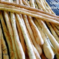 Grissini - crunchy Italian breadsticks cooling on rack @allourway.com