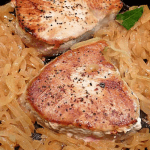 Fresh Tuna With Caramelized Onions in black skillet