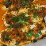 Spicy Lemon Sea Trout in White Casserole pan with paprika lemon caper sauce.