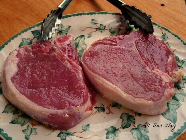 Pork chops are ready for seasoning and the put on the grill @allourway.com