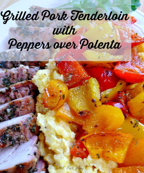 Sliced pork tenderloin with colored peppers over polenta.