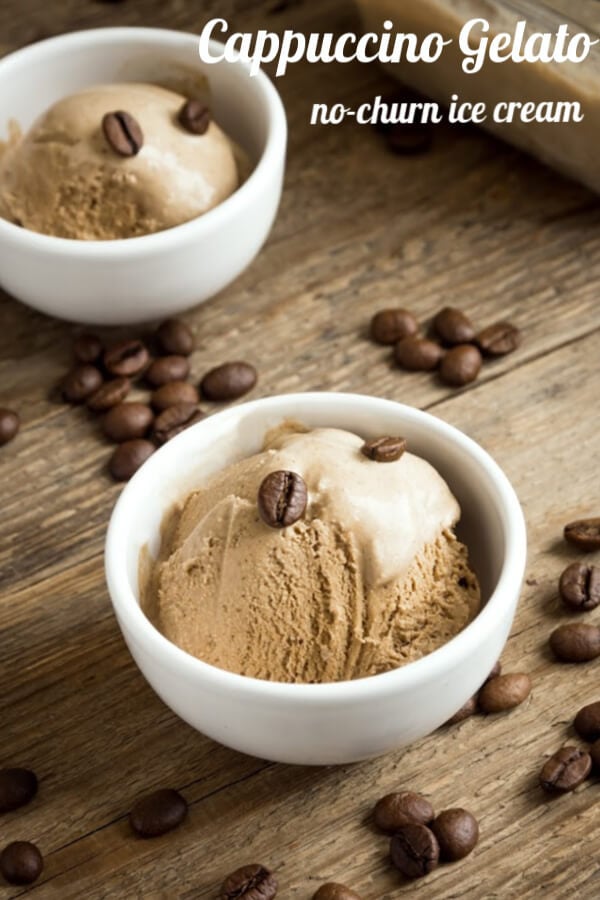 Two white bowls with cappuccino ice cream on a rustic wooden table and coffee beans strewn around the bowl. 