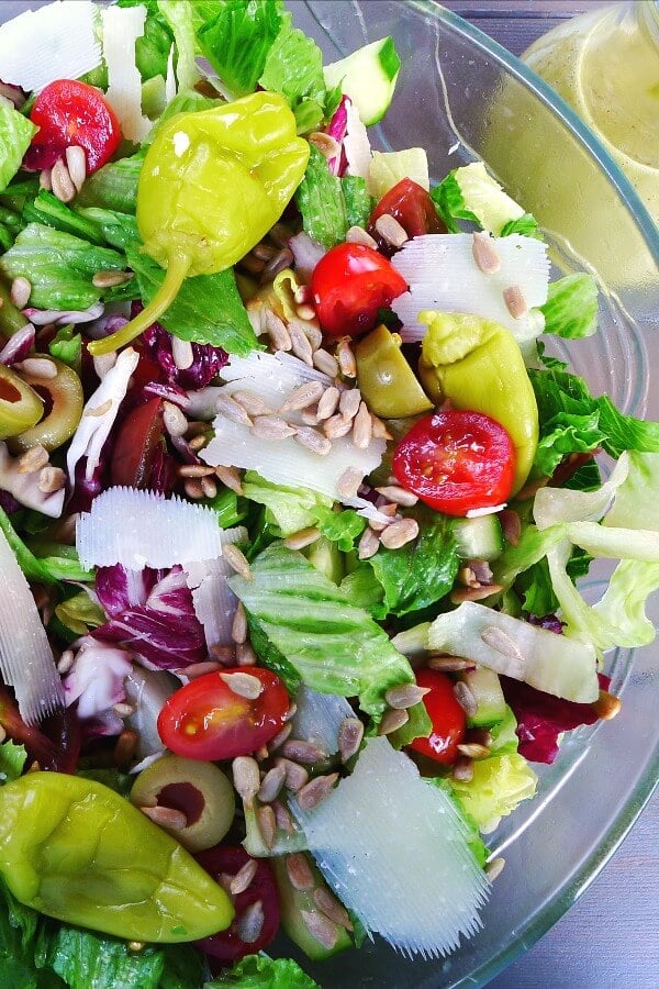 Fresh and crisp tossed salad with Italian flavors. This Italian Summer Salad recipe is a springboard for making a myriad variations to this tossed salad. Serve it as an accompaniment or as a meal it itself. Summer salads offer countless variations and this recipe gives you plenty of ideas. #summersalad, #Italiansalad, #tossedsalad, #allourway