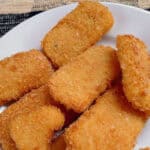 Fried polenta rectangles fried and served as an appetizer.