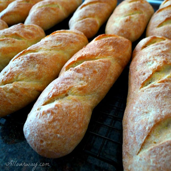 Hoagie type rolls cooling on a black marble top @allourway.com