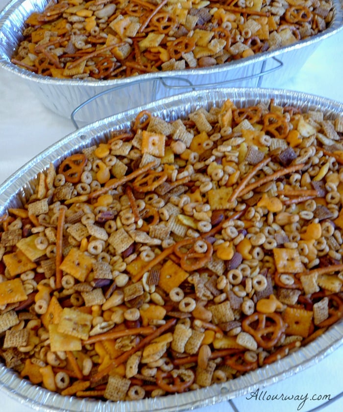 Two large roasting pan filled with Party Mix will go along with the Piña Colada Biscotti to give as gifts @allourway.com