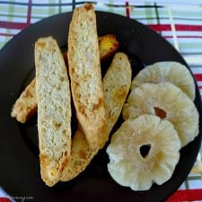 Piña Colada Biscotti a crunchy Italian cookie. Pineapple, coconut and macadamia nuts adds a tropical touch @allourway.com
