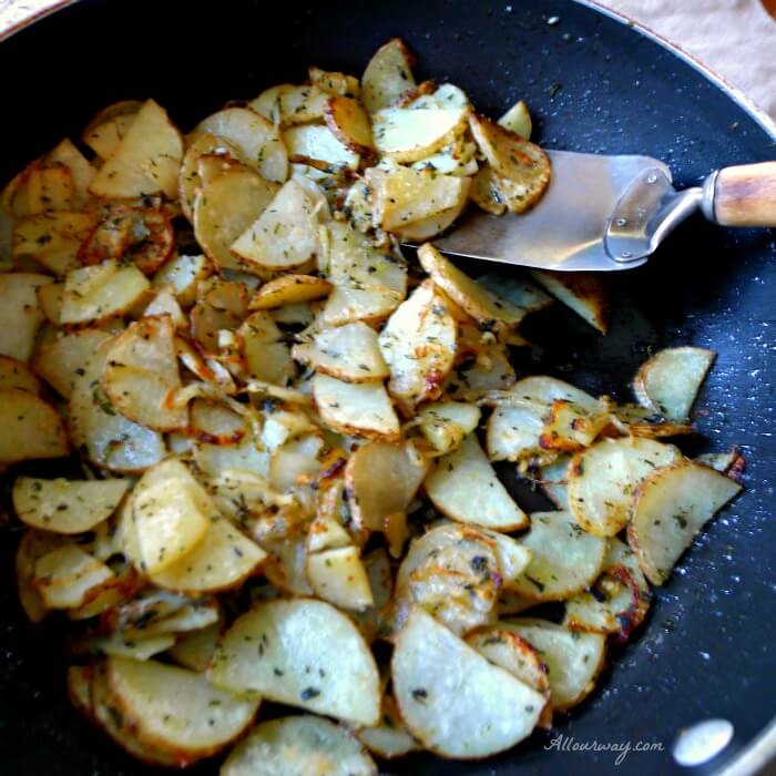 Skillet Fried Italian Herbed Potatoes sautéed in skillet and seasoned with fresh herbs @allourway.com