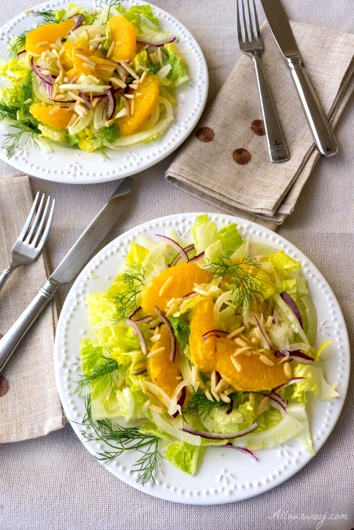 Fennel Orange Salad with aromatic fennel, sweet orange segments, slivered purple onion over romaine can be prepared ahead of time @allourway.com