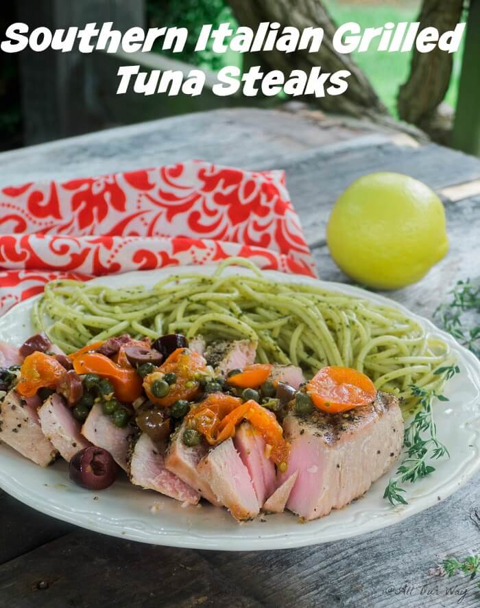 Southern Italian Grilled Tuna Steaks are topped with the flavors of tomatoes, lemon, capers and olives @allourway.com