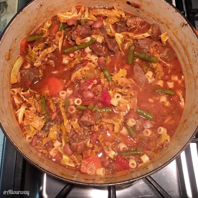 Rustic Italian Vegetable Beef Stew cooking in Dutch oven @allourway.com