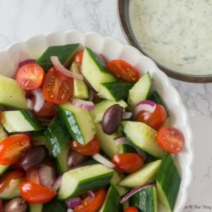 Mediterranean Tomato Cucumber Salad with Spicy Yogurt Dressing @allourway.com