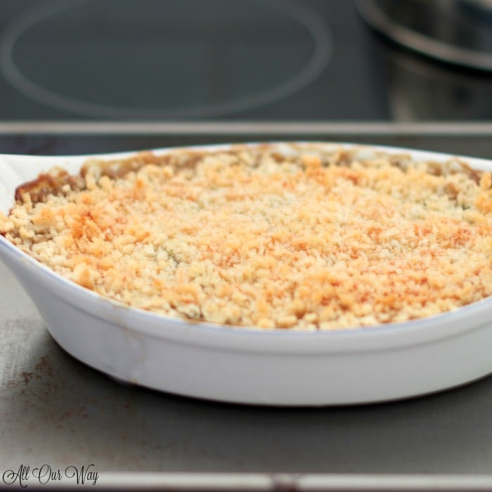 Spinach gratin with brown bread crumbs in oven. 