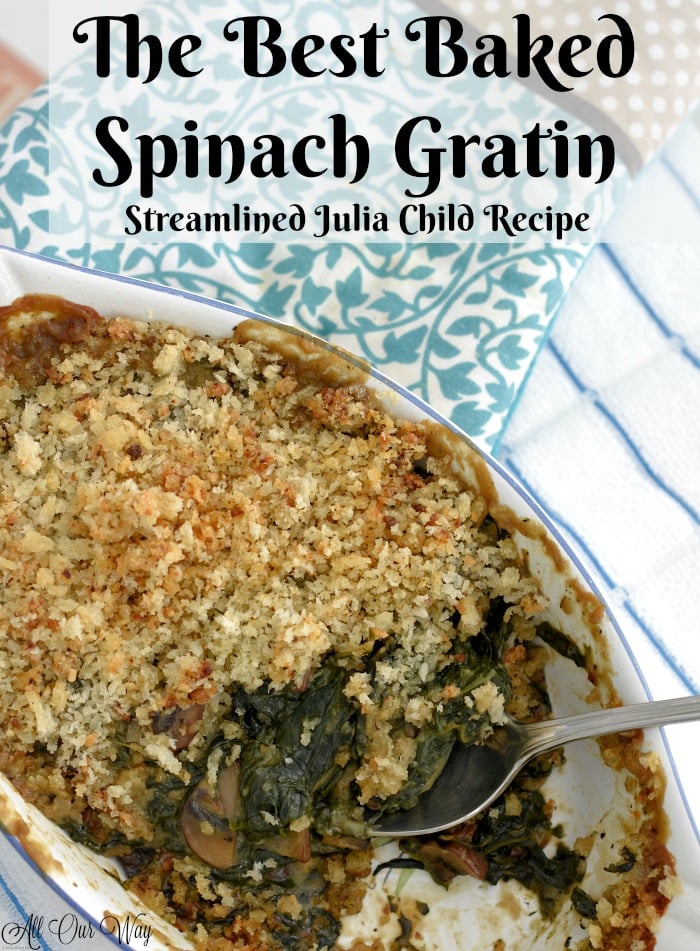 White baking dish with creamed spinach and browned bread crumbs on top with a turquoise and white flower print tea towel on the side. 