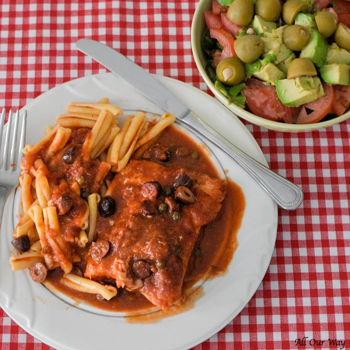 Baked Cod Puttanesca is a quick an easy recipe that cooks fillets with a spicy tomato sauce that's boosted with kalamata olives, capers, and red peppers.