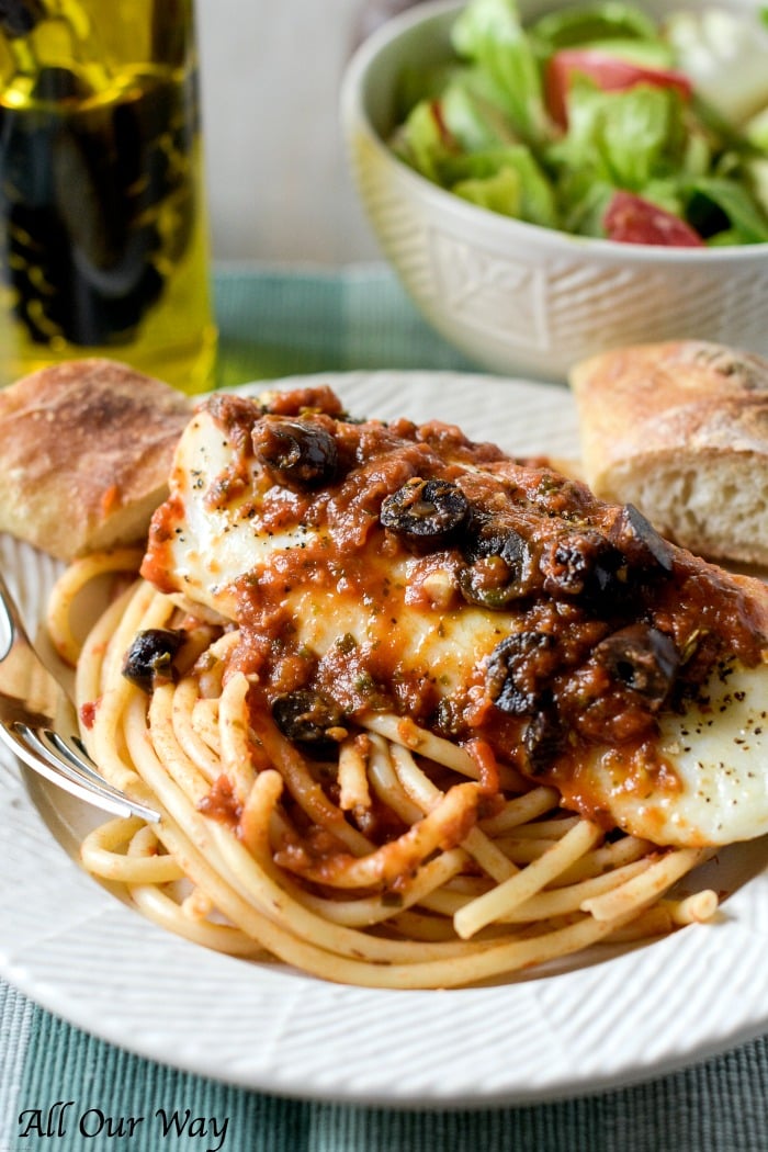 Baked Cod Puttanesca is an quick and easy recipe that cooks fillets with a spicy tomato sauce that's boosted with kalamata olives, capers, and red pepper flakes. 