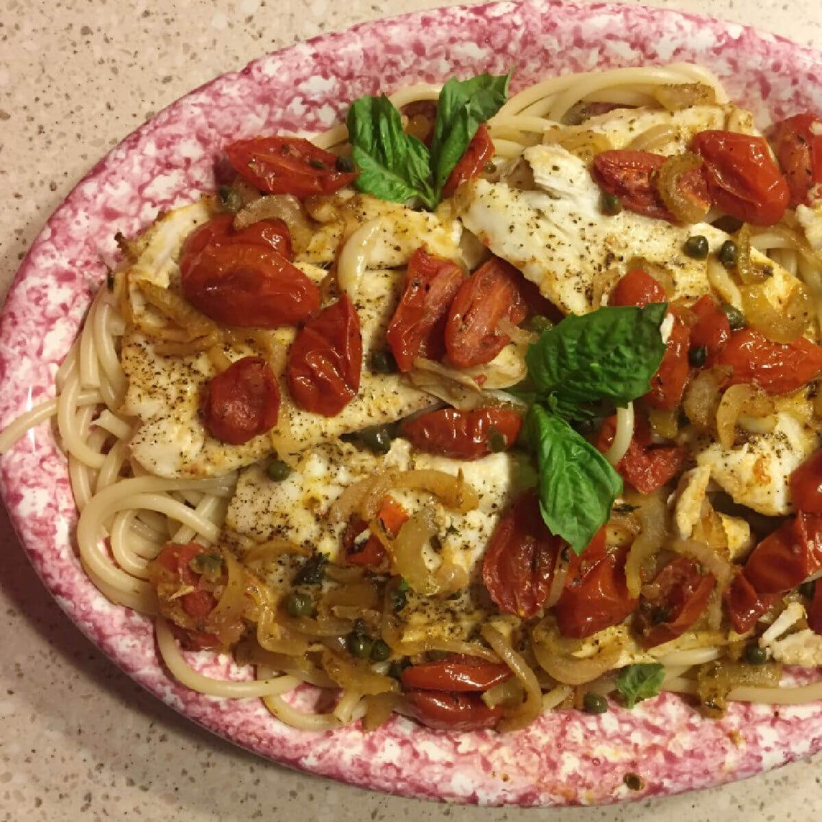 Baked Flounder Italian Style with Fresh Cherry Tomato Herb Sauce a quick and easy recipe.