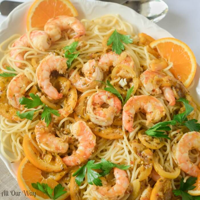 One Pan Orange Lemon Shrimp A Citrusy Touch of Capri is a light yet tasty seafood dish over pasta. 