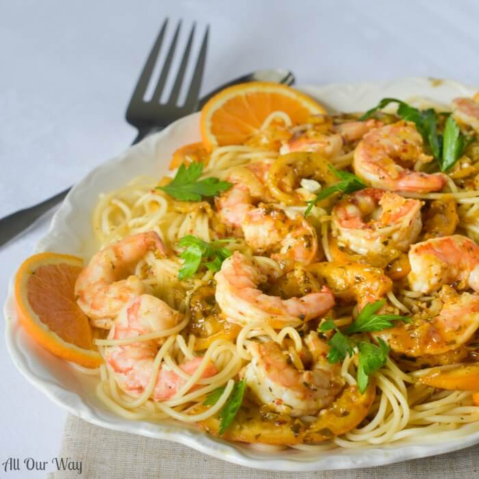 One Pan Orange Lemon Shrimp A Citrusy Touch of Capri is a light yet tasty seafood dish over pasta. 