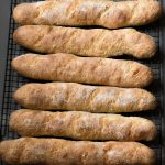 Crusty French Baguettes 4 hour recipe can be made in long loaves or rolls. Easy recipe with no starter necessary.