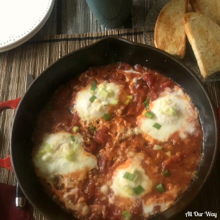 Spicy Eggs in Purgatory an Italian dish that poaches eggs in a spicy tomato sauce. 