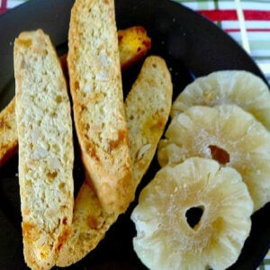Piña Colada Biscotti a crunchy Italian cookie. Pineapple, coconut and macadamia nuts adds a tropical touch.