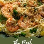 Shrimp Scampi with Angel Hair Pasta on green dish.