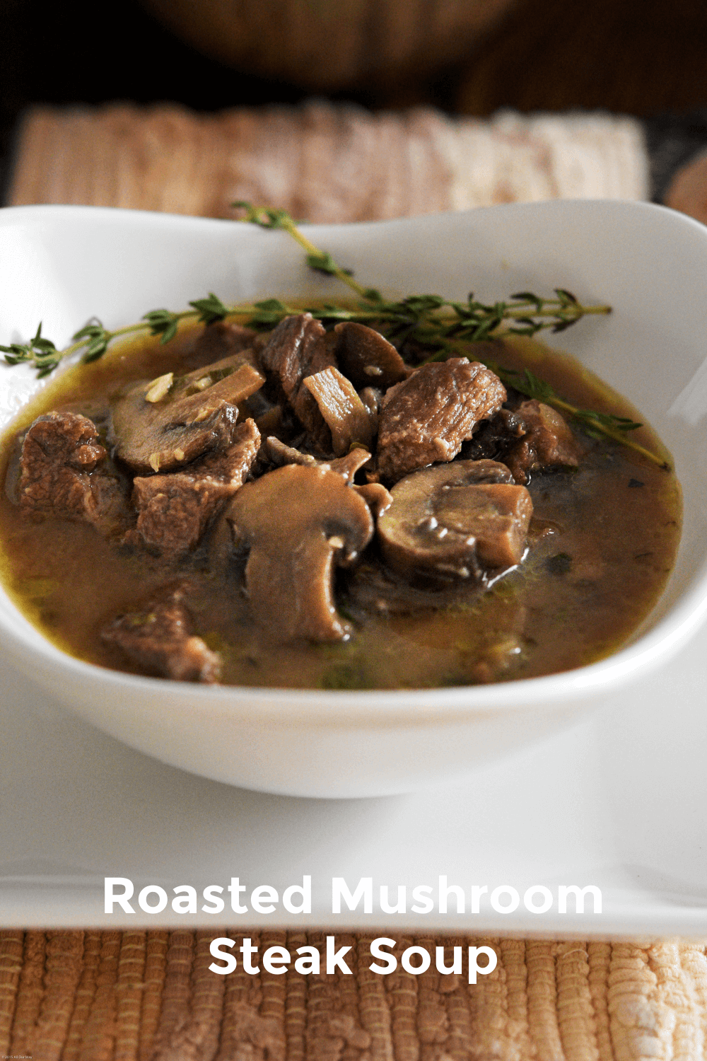 Juicy tender bites of beef in a mushroom infused broth makes up a hearty soup that reminds you of a rich stew in soup form. This soup is much lighter than a stew with the baby spinach and kale instead of the heavier root vegetables. This soup is a complete meal in itself.#beefsoup, #steaksoup, #mushroomsteaksoup, #heartysoup, #wildmushroomsoup, #chucksteak, #bestbeefforsoupstew