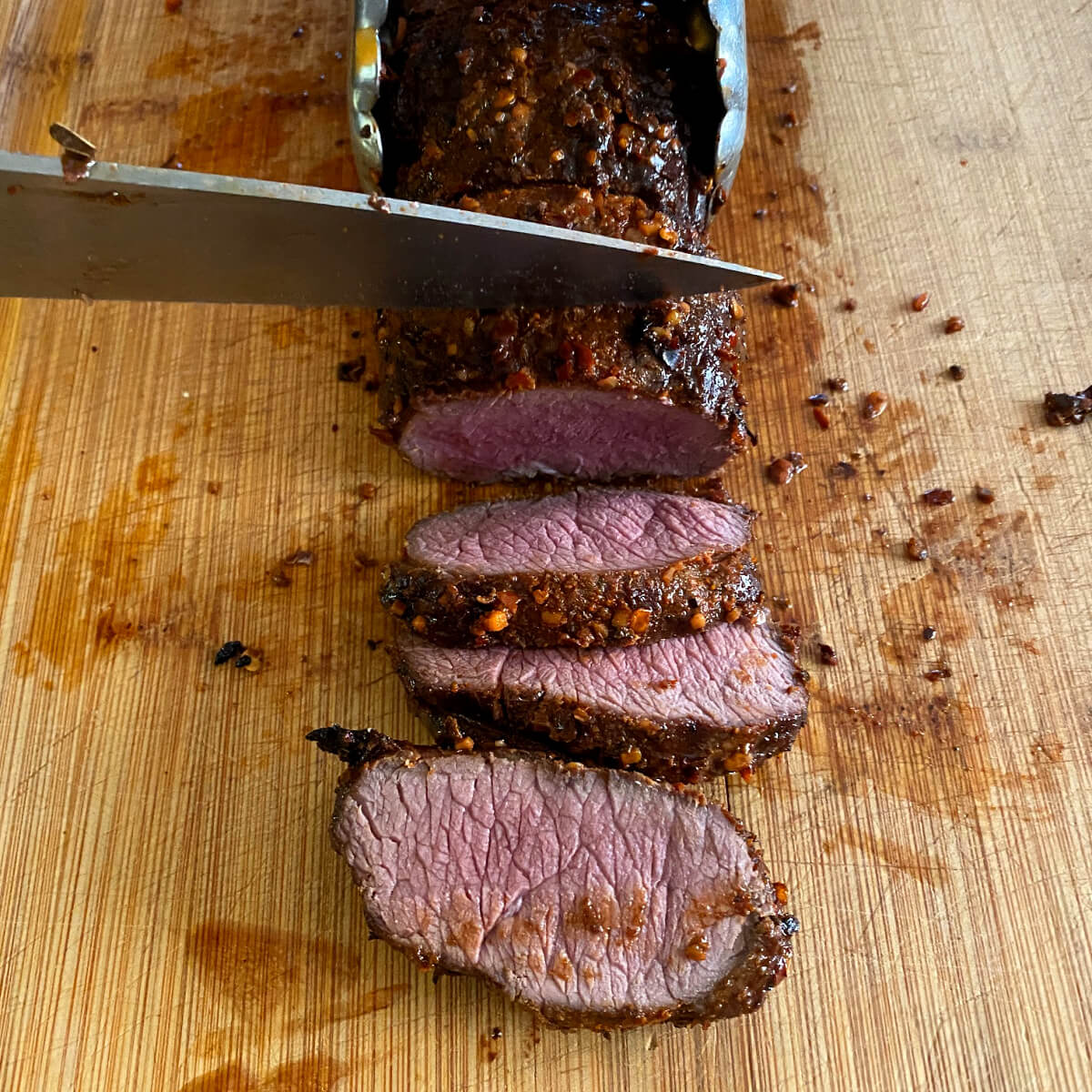 Venison loin slices after being grilled. 