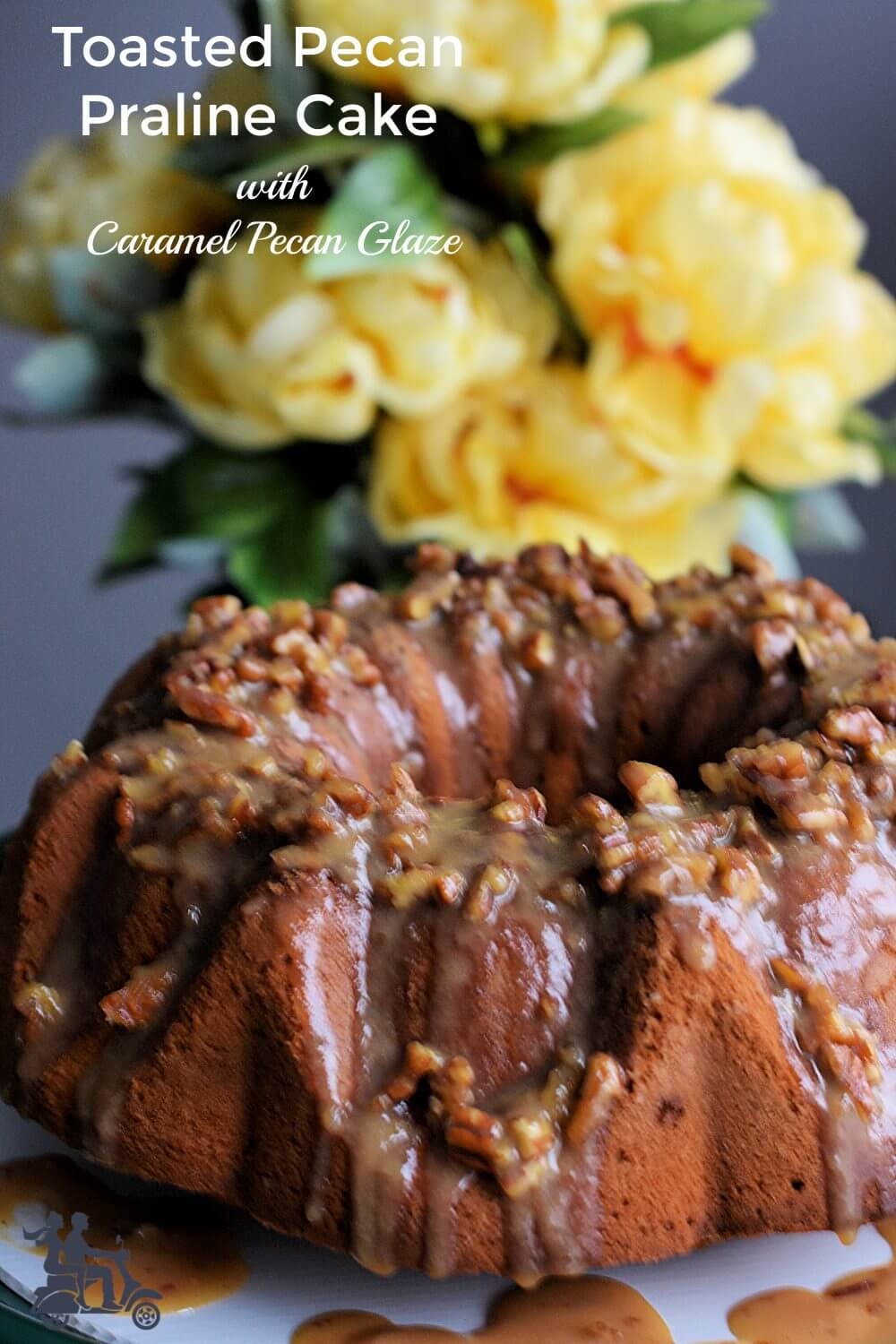 This is a butter rich pound cake that's soft and moist and studded with toasted pecans and heath bits. To finish it off we pour a caramel pecan glaze over it adding to the fantastic flavor. A cake that's an easy dessert to make but beautiful and flavorful so that it makes an occasion special.