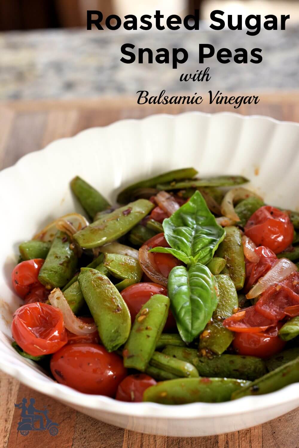 Sweet sugar snap peas, onions and grape tomatoes roast with spicy red pepper flakes and Italian seasoning. The quick vegetable side finishes with a touch of balsamic vinegar to balance the sweetness with a touch of tang. A company worthy vegetable that is easy to throw together.