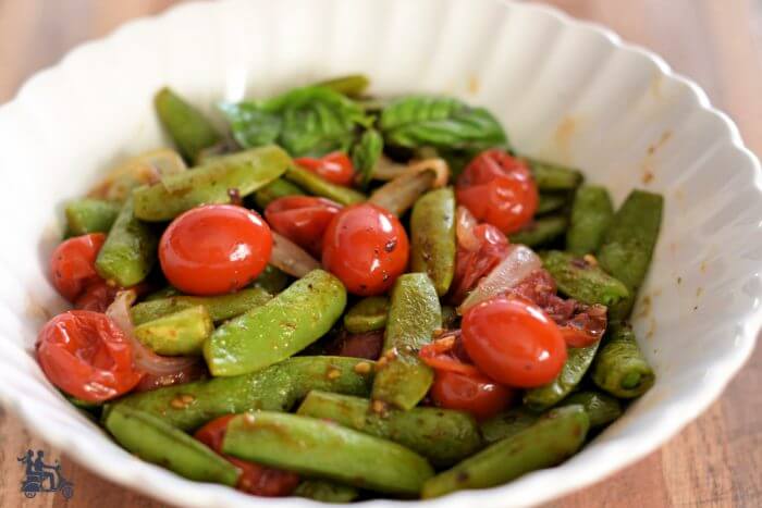 Roasted Snap Peas in a bowl with grape tomatoes