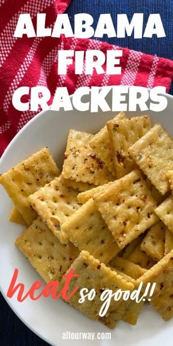 Party Crackers made with ranch dressing in a bowl with red striped tea towel. 