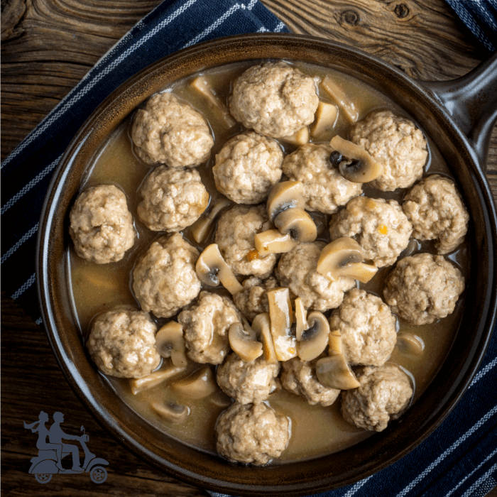 Cast iron skillet with Italian meatballs in Mushroom gravy. 