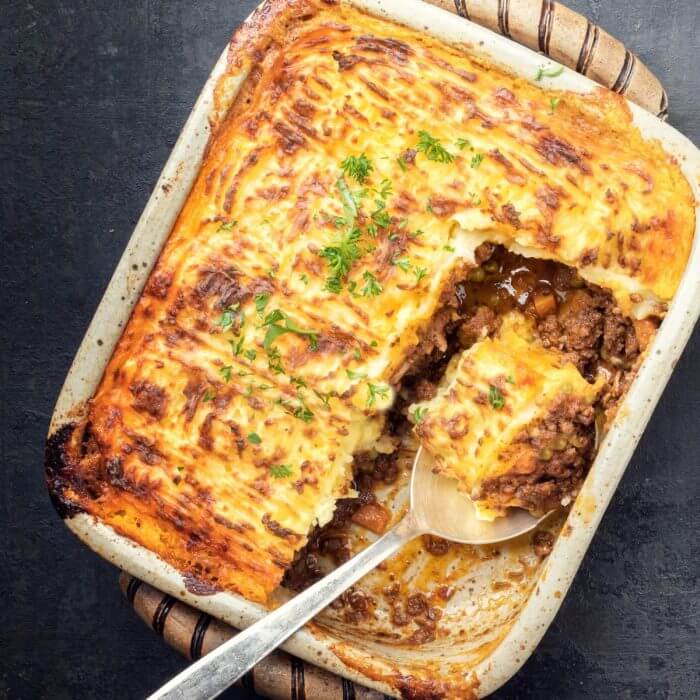 Shepherd's Pie with a spoon full of the casserole. 