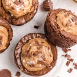 Dense Fudgy brownie cupcakes are filled with peanut butter sweetened with caramel syrup.