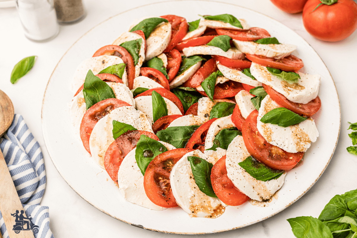 Insalata Caprese Close up. A dish that features the color of the Italian flag - red, white, green. 