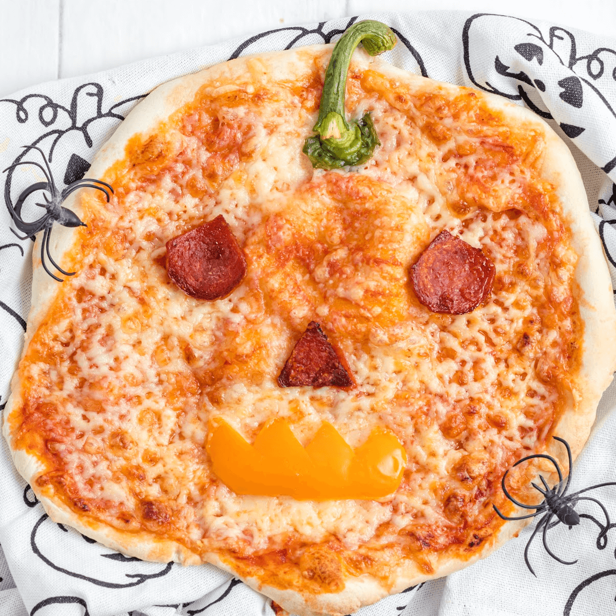 Halloween Jack-O-Lantern Pizza.
