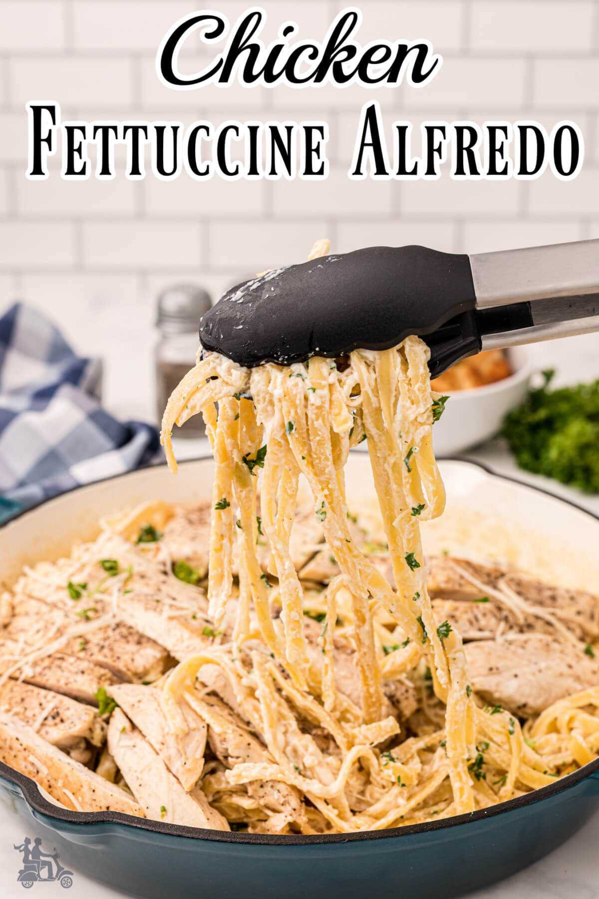 Creamy chicken fettuccine pasta covered in Alfredo sauce with thin slices of chicken breast. 