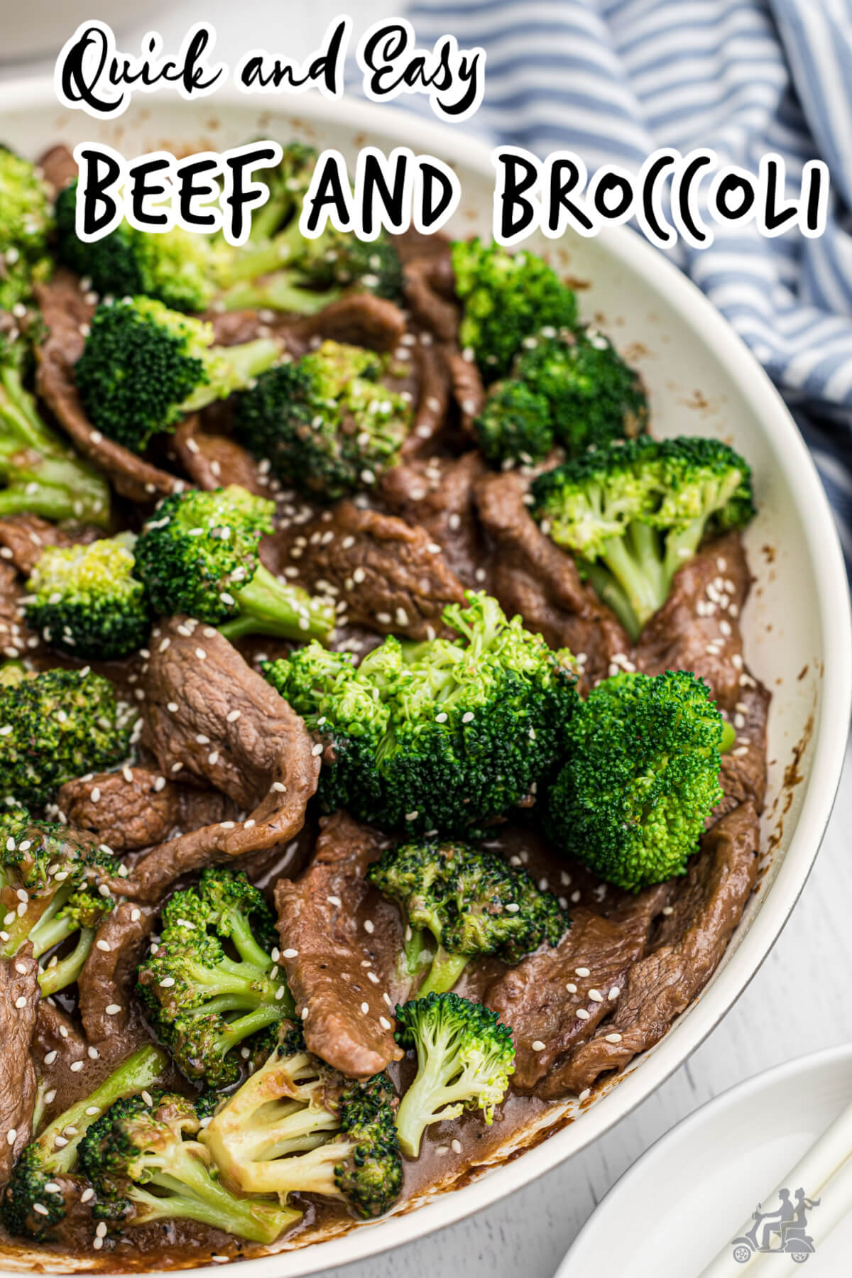 Broccoli and Beef with sesame seeds in white bowl.