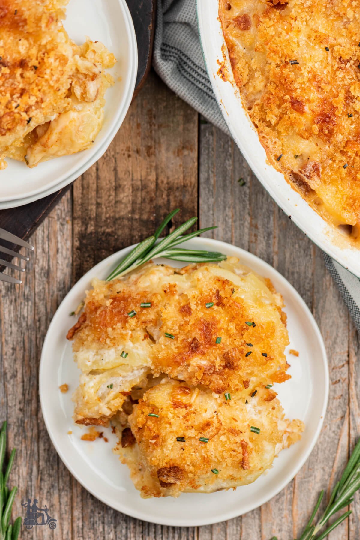 Serving of gratin potatoes on plate. 