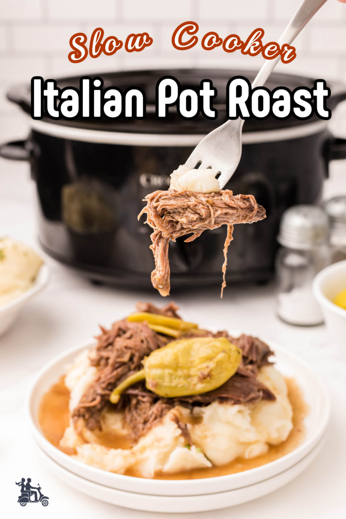 A forkful of Italian Pot Roast with mashed potatoes. 