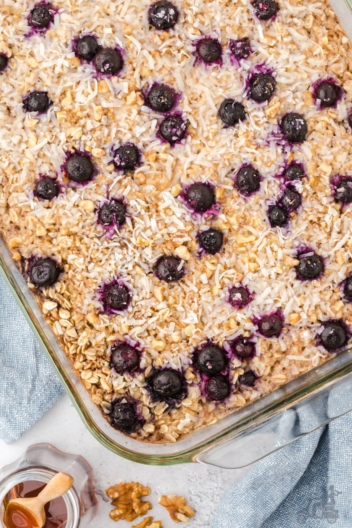 Healthy Oats baked with blueberries and bananas in a large baking dish. 