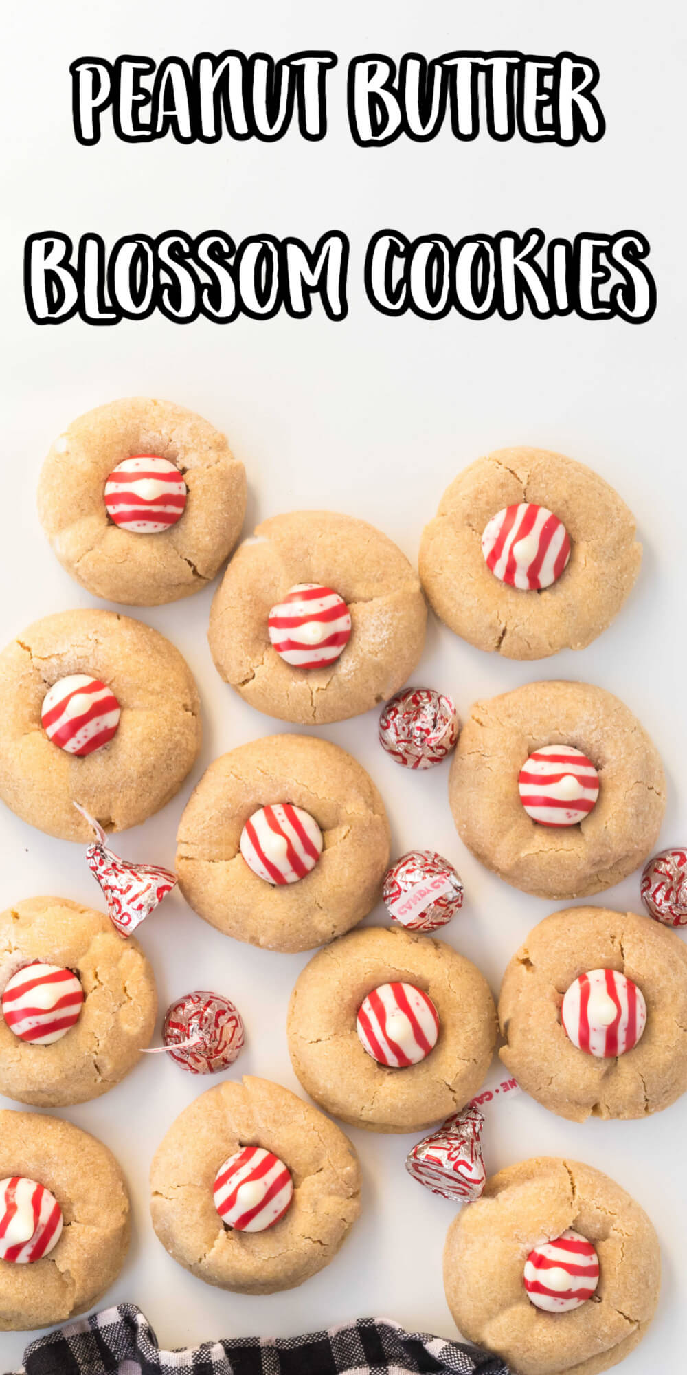 Soft and Chewy the Peanut Butter Blossom Cookies recipe is perfect for any holiday or bake sale. Switch out the Hershey's kiss to suit the occasion. These are the best peanut butter cookies you'll ever eat. The Blossoms are one of the most popular cookies during the Christmas season.